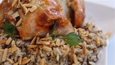 طريقة تحضير دجاج محشي مع الارز ولحمة