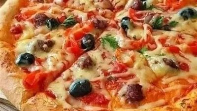 طريقة عمل عجينة البيتزا الهشه روعه